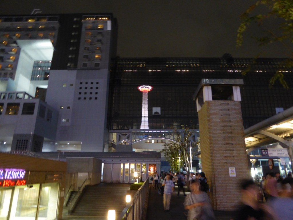 Kyoto sister radio tower reflected in the train station building